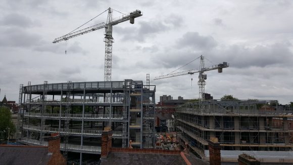 A building site with cranes.