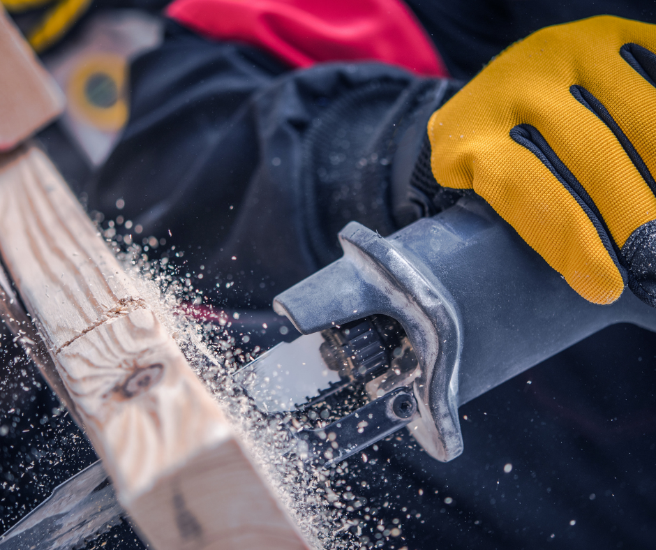 hand holding a reciprocating saw